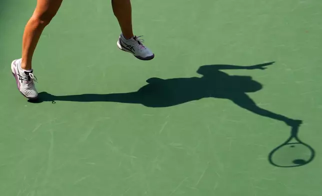 Jasmine Paolini, of Italy, returns the ball to Veronika Erjavec, of Slovenia, during the first round of the U.S. Open tennis championships Sunday, Aug. 30, 2026, in New York. (AP Photo/Yuki Iwamura)