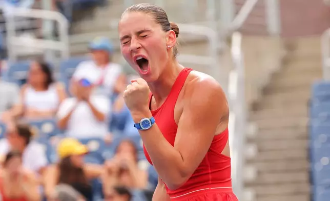 Marta Kostyuk, of Ukraine, reacts following a match against Storm Hunter, of Australia, during the first round of the U.S. Open tennis championships, Sunday, Aug. 30, 2026, in New York. (AP Photo/Andres Kudacki)