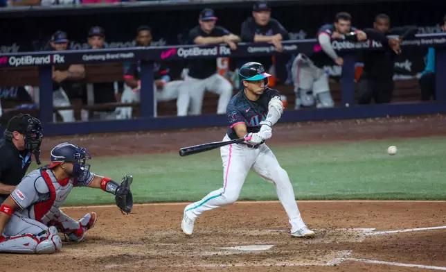 Miami Marlins' Javier Sanoja hits the game-winning RBI single during the ninth inning of a baseball game against the Washington Nationals, Friday, Aug. 21, 2026, in Miami. (AP Photo/David Santiago)