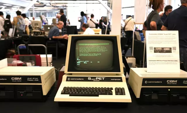 A 1981 Commodore SP9000 “Super PET” computer and floppy disk drives are displayed at the Vintage Computer Festival in Mountain View, Calif., Sunday, Aug. 2, 2026. (AP Photo/Terry Chea)
