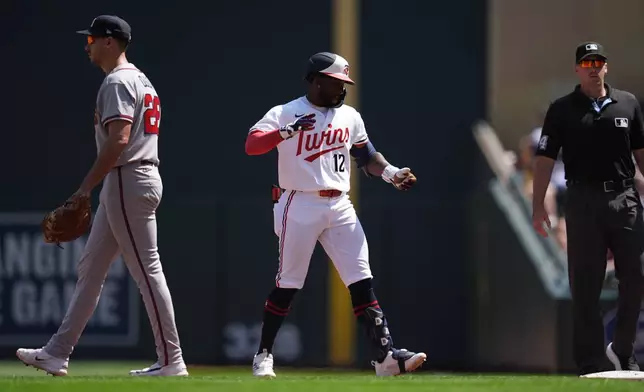Minnesota Twins' Kaelen Culpepper (12) celebrates after hitting a single during the fifth inning of a baseball game against the Atlanta Braves, Wednesday, Aug. 19, 2026, in Minneapolis. (AP Photo/Abbie Parr)