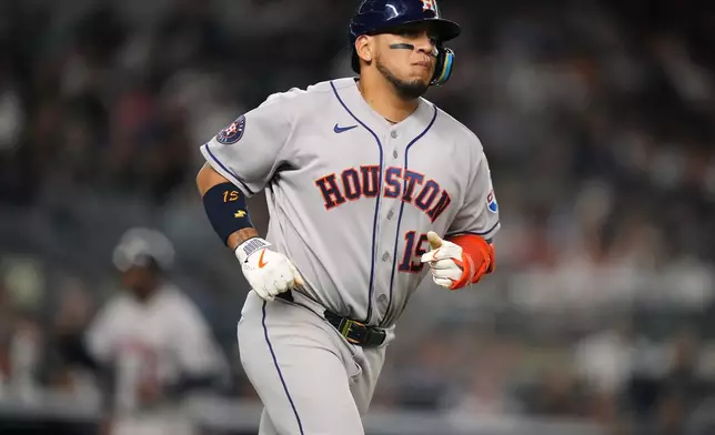 Houston Astros' Isaac Paredes (15) runs to first base for a RBI single during the eighth inning of a baseball game against the New York Yankees Tuesday, Aug. 25, 2026, in New York. (AP Photo/Frank Franklin II)