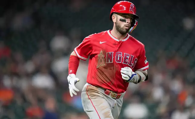 Los Angeles Angels' Zach Neto rounds the bases after hitting a three-run home run against the Houston Astros during the fifth inning of a baseball game Thursday, Aug. 20, 2026, in Houston. (AP Photo/Eric Christian Smith)