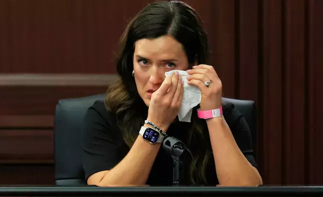 Kirsten Bridegan reacts on the witness stand in the trial of Mario Fernandez Saldana at the Duval County Courthouse, Monday, Aug. 17, 2026, in Jacksonville, Fla. (Corey Perrine/The Florida Times-Union via AP, Pool)