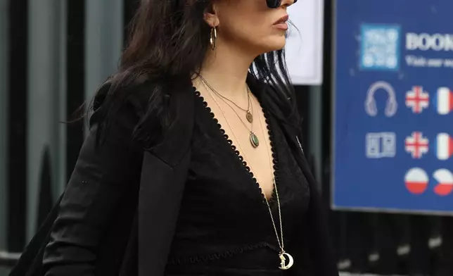 Imelda May arrives for the funeral of Glen Hansard at St Patrick's Cathedral in Dublin, Tuesday, Aug. 4, 2026. (Damien Eagers/PA via AP)