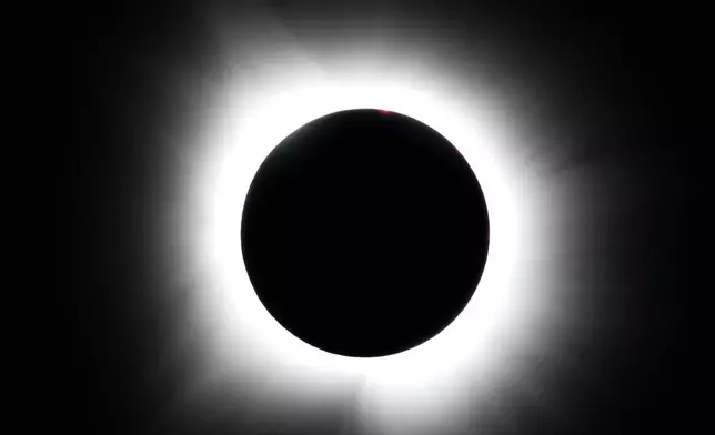 FILE -A total solar eclipse is seen from Arlington, Texas, April 8, 2024. (AP Photo/Julio Cortez, File)