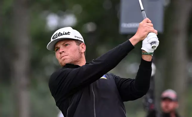 Michael Brennan hits from the fifth tee during the final round of the Rocket Classic golf tournament Sunday, Aug. 2, 2026, in Detroit. (AP Photo/Jose Juarez)