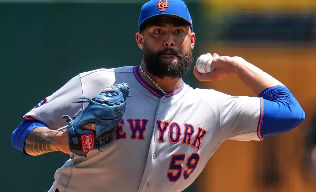 New York Mets pitcher Sean Manaea delivers during the first inning of a baseball game against the Pittsburgh Pirates in Pittsburgh, Sunday, Aug. 9, 2026. (AP Photo/Gene J. Puskar)
