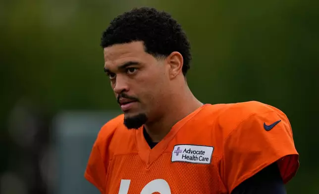 Chicago Bears quarterback Caleb Williams (18) arrives for a joint NFL football practice with the Cincinnati Bengals, Thursday, Aug. 20, 2026, in Cincinnati. (AP Photo/Carolyn Kaster)