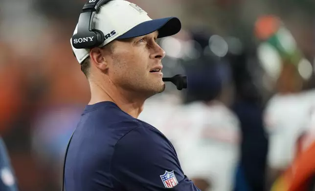 Chicago Bears head coach Ben Johnson looks at the scoreboard during the second half of a preseason NFL football game against the Cincinnati Bengals on Saturday, Aug. 22, 2026, in Cincinnati. (AP Photo/Joshua A. Bickel)