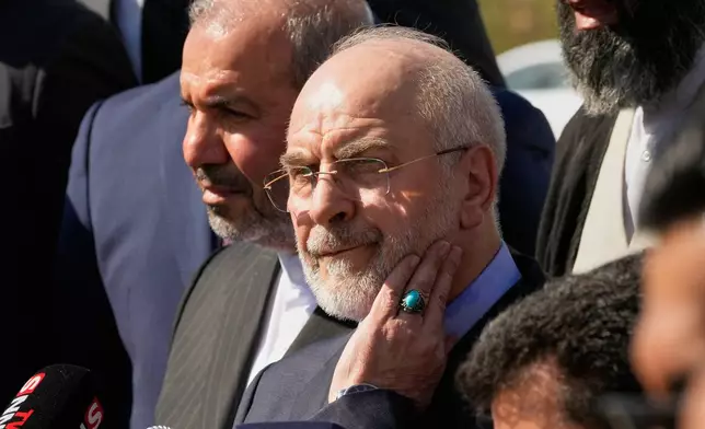 Iranian Parliament Speaker Mohammad Baqer Qalibaf visits the site near Baghdad International Airport where Iranian military commander Qassem Soleimani was killed in a U.S. drone strike, in Baghdad, Iraq, Wednesday, Aug. 19, 2026.(AP Photo/Hadi Mizban)