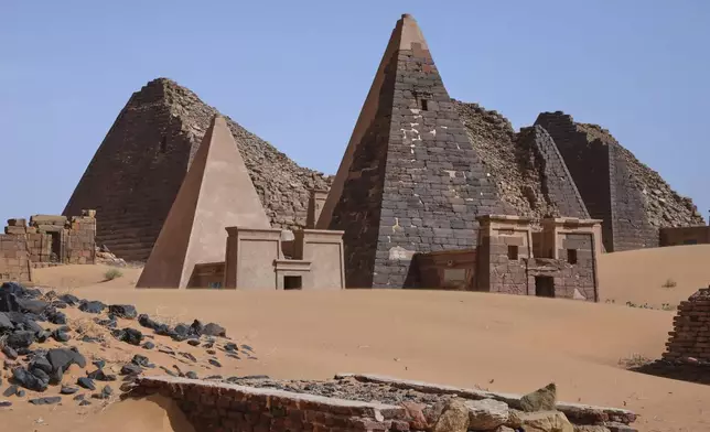 The Meroe pyramids stand at the Meroe archaeological site in Bejrawiya, Sudan, Saturday, Aug. 1, 2026. (AP Photo/Mohnd Blal)