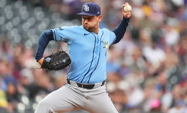Tampa Bay Rays starting pitcher Ian Seymour works against the Colorado Rockies in the first inning of a baseball game Monday, Aug. 3, 2026, in Denver. (AP Photo/David Zalubowski)