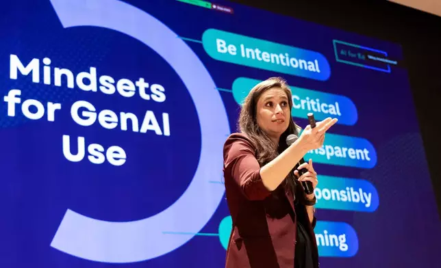 Amanda Bickerstaff, CEO of AI for Education, speaks at Academic Magnet High School during the Charleston County School District Charleston Educator Symposium Wednesday, July 22, 2026 in North Charleston, S.C. (AP Photo/Mic Smith)