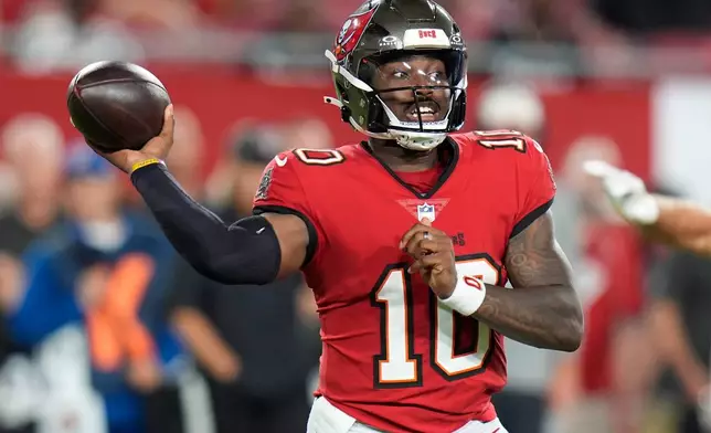 Tampa Bay Buccaneers' Jalon Daniels (10) passes in the second half of an NFL preseason football game against the Kansas City Chiefs, Saturday, Aug. 22, 2026, in Tampa, Fla. (AP Photo/Chris O'Meara)