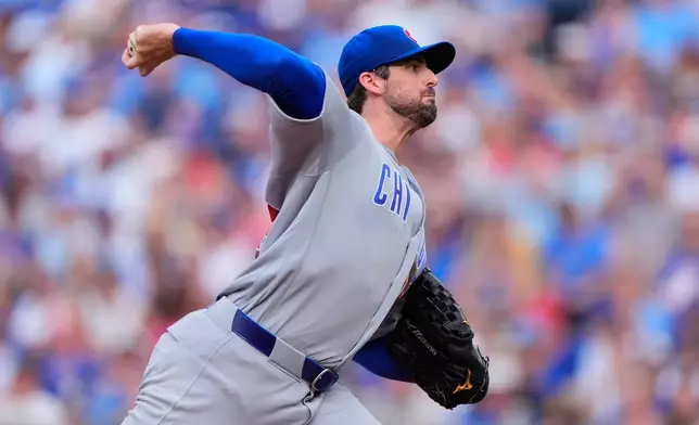 Chicago Cubs starting pitcher Clay Holmes throws during the first inning of a baseball game against the Kansas City Royals, Saturday, Aug. 8, 2026, in Kansas City, Mo. (AP Photo/Charlie Riedel)