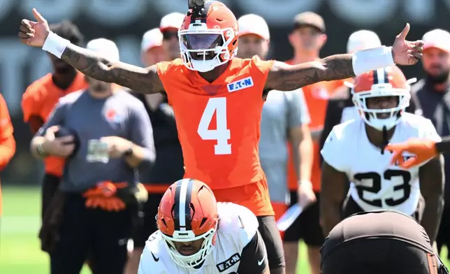 Cleveland Browns quarterback Deshaun Watson (4) calls a play during practice at the team's NFL football training camp, Thursday, July 30, 2026, in Berea, Ohio. (AP Photo/David Richard)