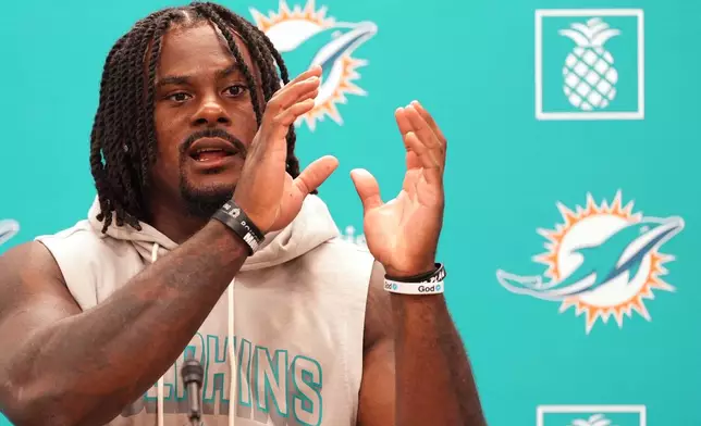 Miami Dolphins quarterback Malik Willis speaks to journalists during NFL football training camp, Tuesday, July 28, 2026, in Miami Gardens, Fla. (AP Photo/Rebecca Blackwell)