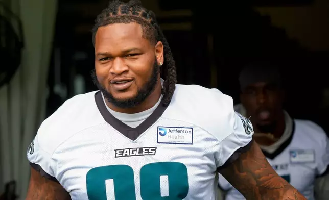Philadelphia Eagles defensive tackle Jalen Carter (98) takes to the field for practice at the team's NFL football training camp in Philadelphia, Thursday, July 30, 2026. (AP Photo/Chris Szagola)