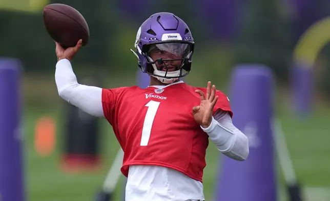 Minnesota Vikings quarterback Kyler Murray (1) takes part in drills during the team's NFL football training camp Wednesday, July 29, 2026, in Eagan, Minn. (AP Photo/Abbie Parr)