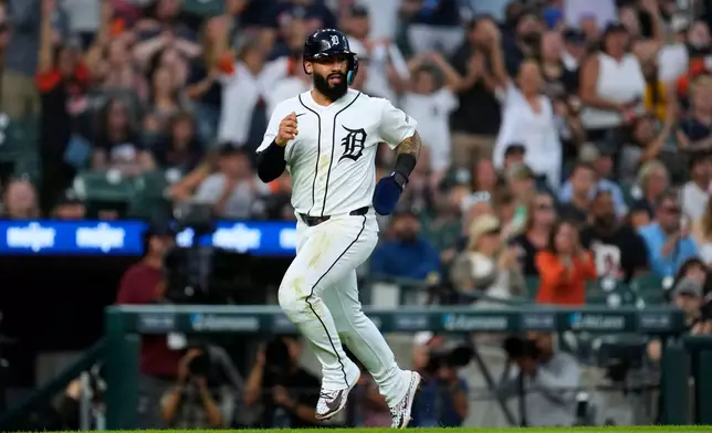 Detroit Tigers' Gleyber Torres rounds third base on his way to score against the Tampa Bay Rays during the fifth inning of a baseball game Tuesday, Aug. 25, 2026, in Detroit. (AP Photo/Paul Sancya)