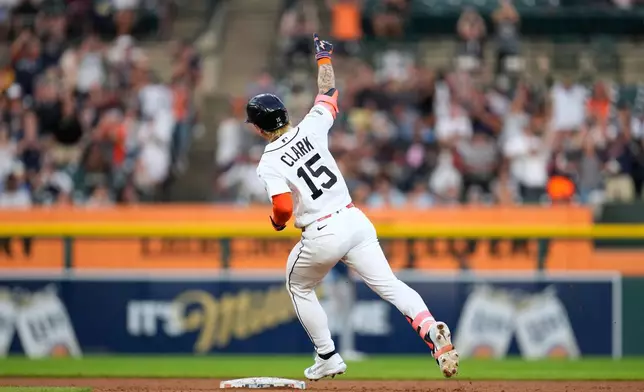 Detroit Tigers' Max Clark rounds second base after hitting a two-run home run against the Tampa Bay Rays during the fifth inning of a baseball game Tuesday, Aug. 25, 2026, in Detroit. (AP Photo/Paul Sancya)