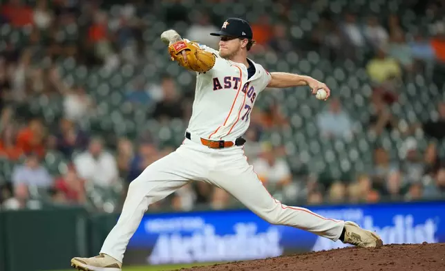Houston Astros pitcher Josh Hader throws against the Los Angeles Angels during the ninth inning of a baseball game Wednesday, Aug. 19, 2026, in Houston. (AP Photo/David J. Phillip)
