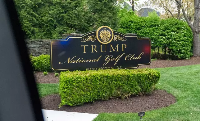 FILE - The sign for Trump National Golf Club is pictured as the motorcade for President Donald Trump arrives, April 19, 2025, in Sterling, Va. (AP Photo/Alex Brandon, File)