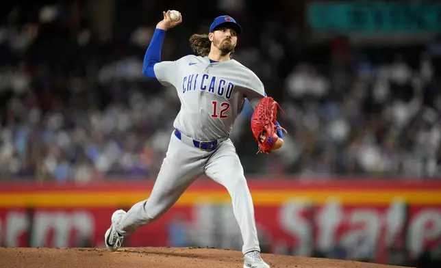 Chicago Cubs starting pitcher Kevin Gausman throws against the Arizona Diamondbacks during the first inning of a baseball game, Monday, Aug. 24, 2026, in Phoenix. (AP Photo/Ross D. Franklin)