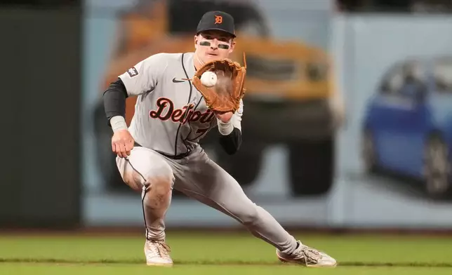 Detroit Tigers third baseman Kevin McGonigle catches a line out hit into by San Francisco Giants' Christian Koss during the sixth inning of a baseball game, Friday, Aug. 7, 2026, in San Francisco. (AP Photo/Jeff Chiu)