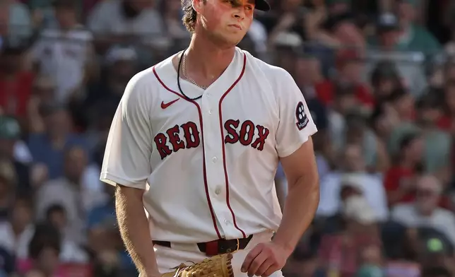 Boston Red Sox pitcher Jake Bennett reacts after giving up a run in the fifth inning of a baseball game against the Athletics, Saturday, Aug. 8, 2026 in Boston. (AP Photo/Jim Davis)