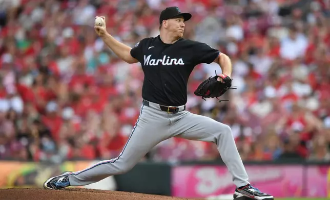 Miami Marlins' Ryan Gusto pitches during the first inning of a baseball game against the Cincinnati Reds on Saturday, Aug. 15, 2026 in Cincinnati. (AP Photo/Tanner Pearson)