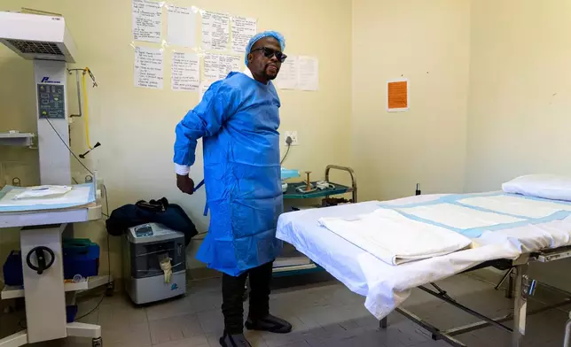 Male midwife Sehloho Ntlhane prepares for prenatal appointments at Mpharane Health Centre in Mohale's Hoek district, Lesotho, Friday, July 10, 2026. (AP Photo/Kayleen Morgan)