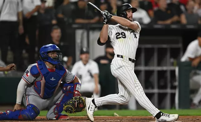 Chicago White Sox's Tristan Peters watches his two-run home during the fifth inning of a baseball game against the Texas Rangers in Chicago, Wednesday, Aug. 26, 2026. (AP Photo/Paul Beaty)