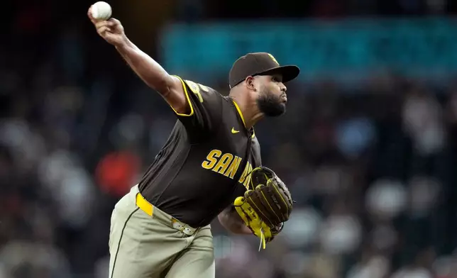 San Diego Padres starting pitcher Randy Vásquez throws against the Arizona Diamondbacks during the first inning of a baseball game, Tuesday, Aug. 4, 2026, in Phoenix. (AP Photo/Ross D. Franklin)