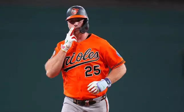 Baltimore Orioles's Pete Alonso gestures as he runs out a two-run home run during the fourth inning of a baseball game against the Texas Rangers, Sunday, Aug. 9, 2026, in Arlington, Texas. (AP Photo/LM Otero)