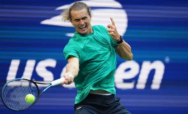 Alexander Zverev, of Germany, returns the ball to Novak Djokovic, of Serbia, during a practice at the U.S. Open tennis championships Wednesday, Aug. 26, 2026, in New York. (AP Photo/Frank Franklin II)