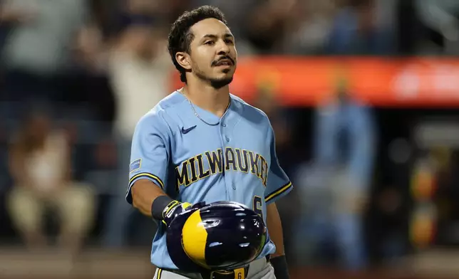 Milwaukee Brewers' David Hamilton reacts after lining out during the ninth inning of a baseball game against the New York Mets on Tuesday, Aug. 25, 2026, in New York. (AP Photo/Adam Hunger)