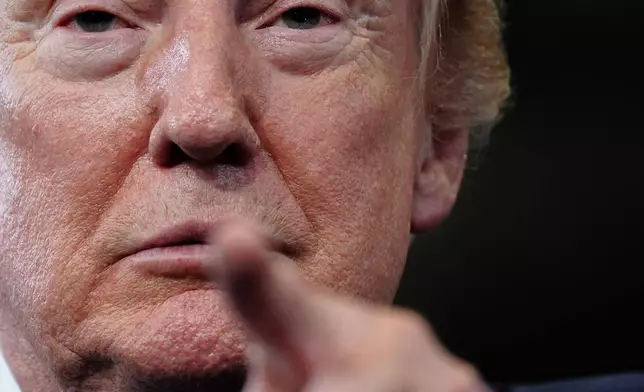 President Donald Trump speaks at the David Mack Center for Training and Intelligence, Friday, Aug. 14, 2026, in Garden City, N.Y. (AP Photo/Julia Demaree Nikhinson)