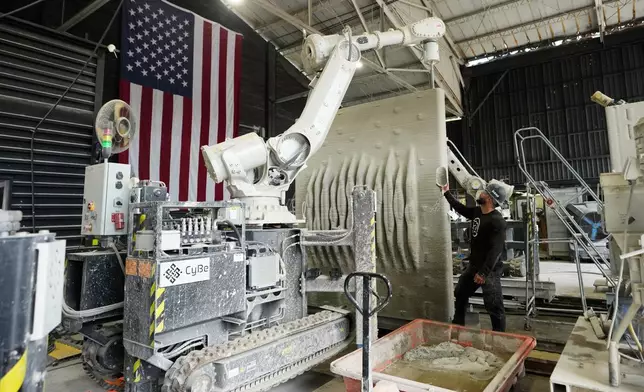 A 3D-printed living seawall is manufactured at the Kind Designs facility Tuesday, June 30, 2026, in Miami. (AP Photo/Lynne Sladky)