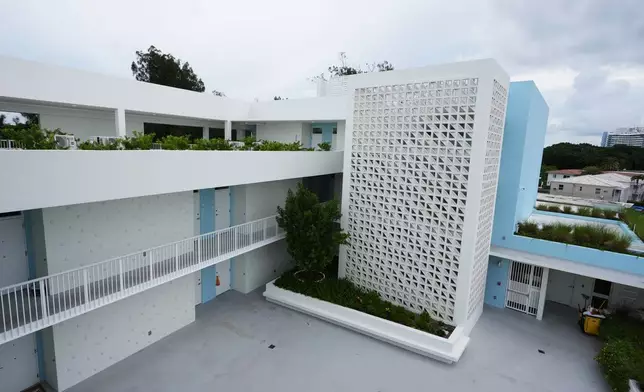 The Vista Breeze affordable senior housing project, designed by the architectural firm Brooks Scarpa Huber, is elevated 10 feet from sea level, and is a real-world application of how to live with the threats of water Wednesday, Aug. 5, 2026, in Miami Beach, Fla. (AP Photo/Lynne Sladky)