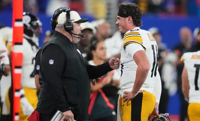 Pittsburgh Steelers head coach Mike McCarthy, left, talks with quarterback Drew Allar, right, in the second half of a preseason NFL football game against the Buffalo Bills in Orchard Park, NY., Thursday, Aug. 27, 2026. (AP Photo/Gene J. Puskar)
