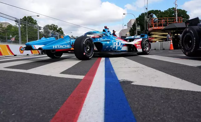 Race car driver Scott McLaughlin's car is seen prior to Sunday's Freedom 250 Grand Prix auto race in Washington, Saturday, Aug. 22, 2026. (AP Photo/Alex Brandon)
