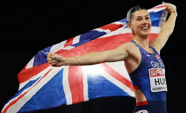 Britain's Amy Hunt celebrates winning the women's 100 meters final at the European Athletics Championships in Birmingham, England, Monday, Aug. 10, 2026. (AP Photo/Morgan Harlow)