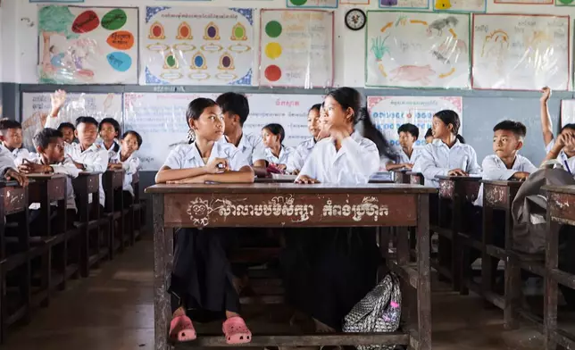 Students in a school in one of the floating villages of Cambodia's Tonle Sap Lake on Monday, June 29, 2026. (AP Photo/Aniruddha Ghosal)