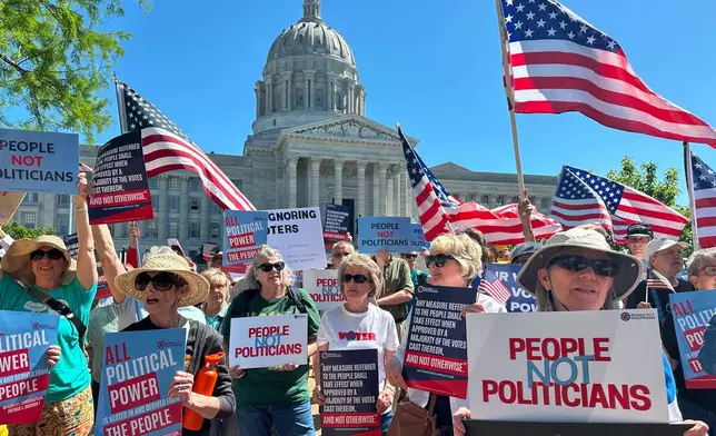 FILE - Protesters against a Missouri congressional redistricting plan gather outside the Missouri Capitol on May 12, 2026, in Jefferson City, Mo. (AP Photo/David A. Lieb, File)