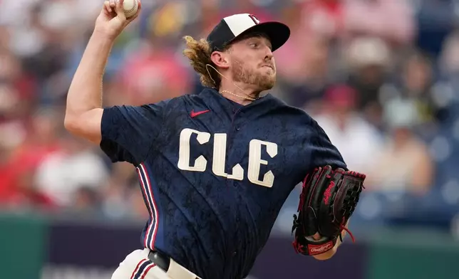 Cleveland Guardians' Tanner Bibee pitches in the first inning of a baseball game against the Arizona Diamondbacks in Cleveland, Friday, July 31, 2026. (AP Photo/Sue Ogrocki)