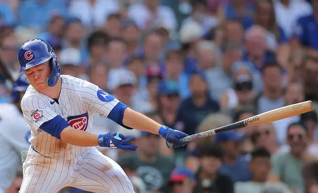 Chicago Cubs' James Triantos strikes out during the sixth inning of a baseball game against the St. Louis Cardinals, Sunday, Aug. 16, 2026, in Chicago. (AP Photo/Melissa Tamez)