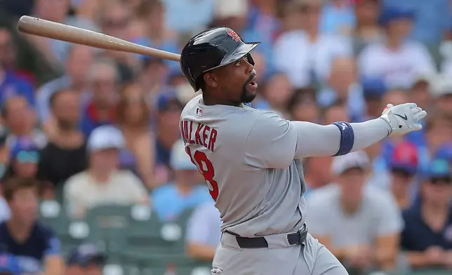 St. Louis Cardinals' Jordan Walker watches his two-run home run during the fourth inning of a baseball game against the Chicago Cubs, Sunday, Aug. 16, 2026, in Chicago. (AP Photo/Melissa Tamez)