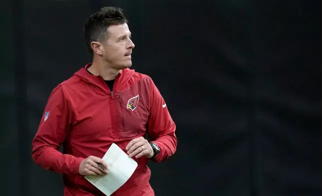 Arizona Cardinals head coach Mike LaFleur watches the action on the field during NFL football training camp, Tuesday, July 28, 2026, in Glendale, Ariz. (AP Photo/Ross D. Franklin)